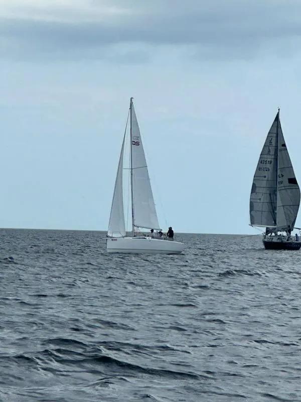 Slide: The Image of Sailboats on the ocean under a cloudy sky, featuring a 2024 Zonda Z24 Base Model. - 29