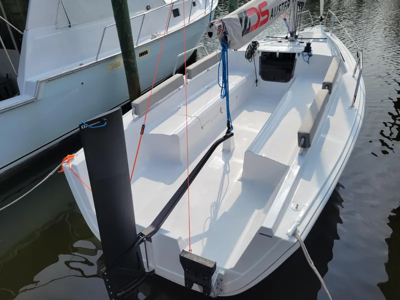 Slide: The Image of 2024 Zonda Z24 Base Model sailboat docked in marina, showcasing sleek design and modern features. - 5