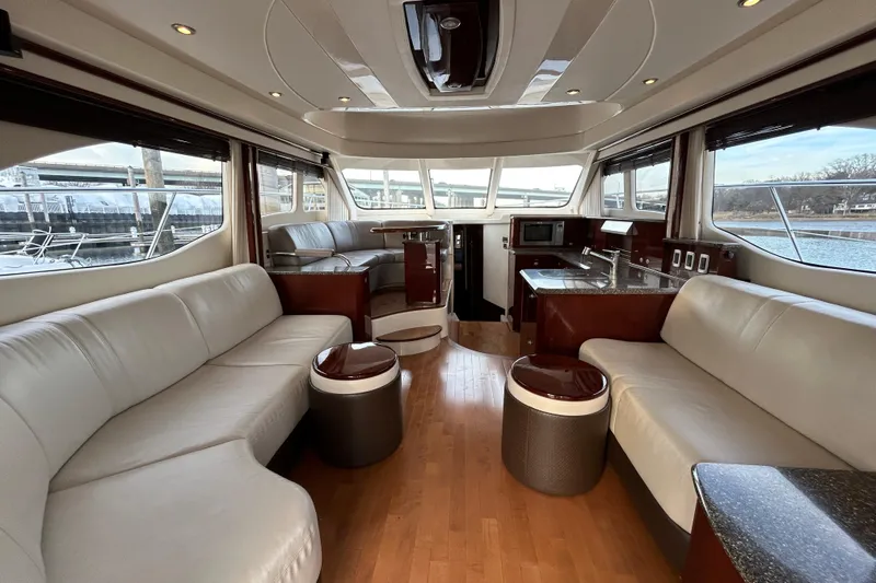 Slide: The Image of Luxurious interior of a 2008 Sea Ray 52 Sedan Bridge yacht with modern furnishings. - 15