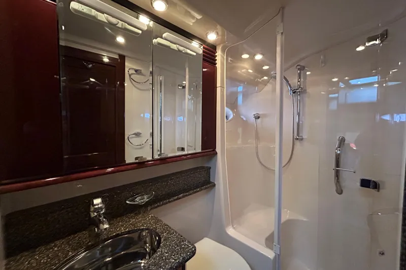 Slide: The Image of Luxurious bathroom in 2008 Sea Ray 52 Sedan Bridge yacht with modern fixtures and shower. - 25