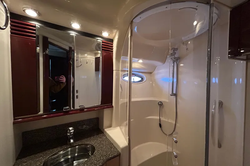 Slide: The Image of Luxurious bathroom in 2008 Sea Ray 52 Sedan Bridge yacht with modern fixtures. - 27