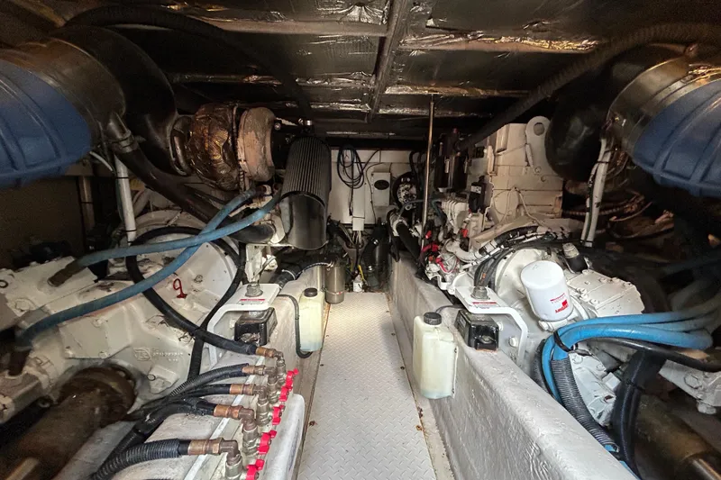 Slide: The Image of Engine room of 2008 Sea Ray 52 Sedan Bridge yacht, showcasing mechanical components. - 30
