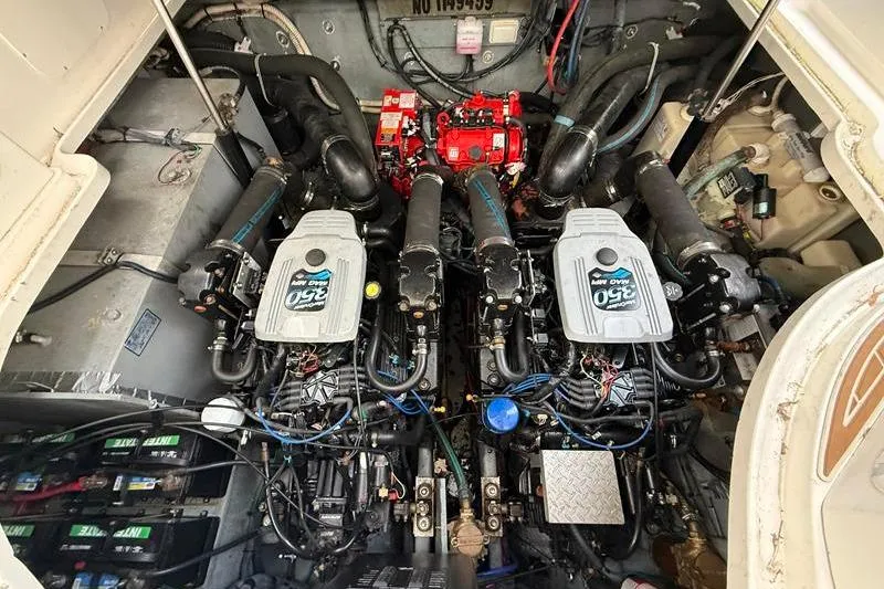 Slide: The Image of Engine compartment of 2003 Sea Ray 320 Sundancer with twin MerCruiser 350 engines. - 22
