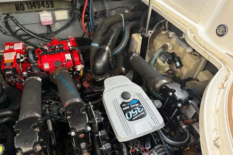 Slide: The Image of Engine compartment of a 2003 Sea Ray 320 Sundancer with MerCruiser 350 MAG MPI engine. - 27