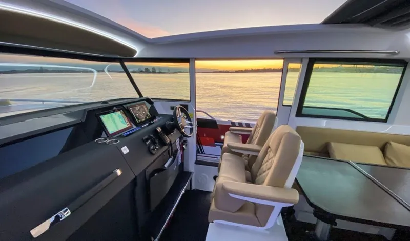 Slide: The Image of Interior of 2021 Axopar 37 XC Cross Cabin at sunset. - 3