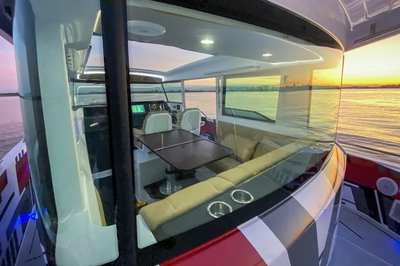 Slide: The Image of Interior of 2021 Axopar 37 XC Cross Cabin at sunset. - 7