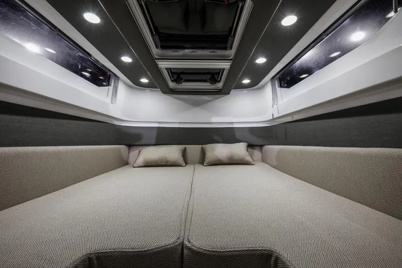 Slide: The Image of Interior of 2021 Axopar 37 XC Cross Cabin with cozy bed. - 8