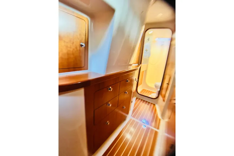 Slide: The Image of Interior of 2007 PDQ MV41 yacht with wooden cabinetry and flooring. - 59