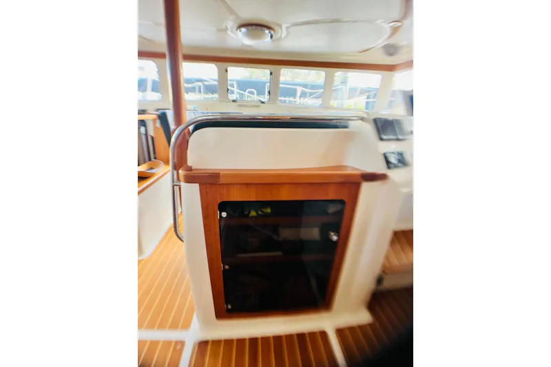 Slide: The Image of Interior of 2007 PDQ MV41 boat with wooden accents and modern design. - 7