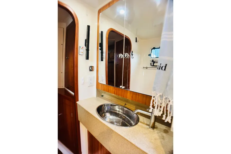 Slide: The Image of Bathroom interior of 2007 PDQ MV41 yacht with sink and mirror. - 71