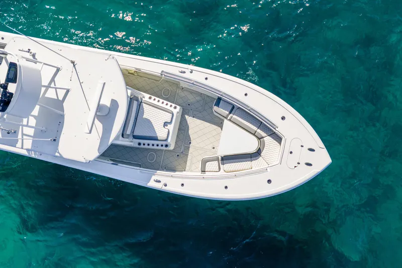 Slide: The Image of Aerial view of 2015 Yellowfin 42 Offshore boat on clear blue water. - 10