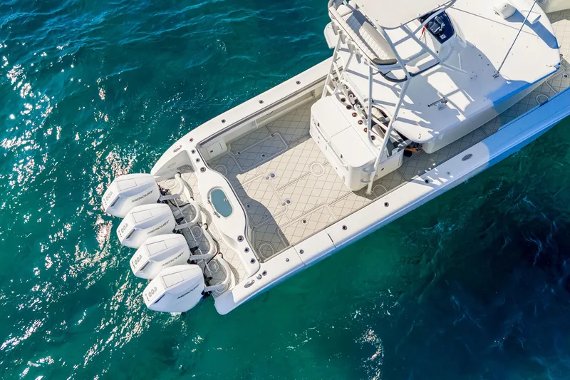 Slide: The Image of Aerial view of 2015 Yellowfin 42 Offshore boat on clear blue water. - 2