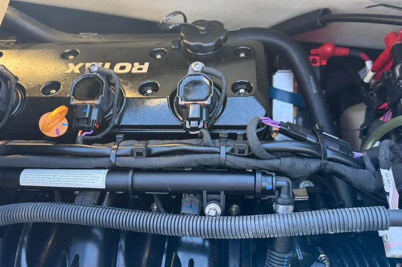 Slide: The Image of Engine compartment of a 2021 Sea-Doo GTI SE 130 with visible Rotax components. - 9