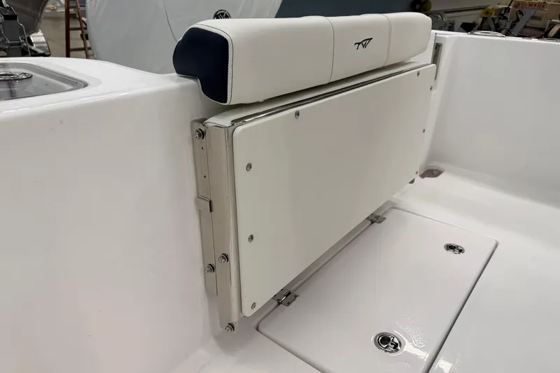 Slide: The Image of 2026 Tidewater 210 CC Adventure boat with Yamaha engine, featuring a foldable seat. - 19