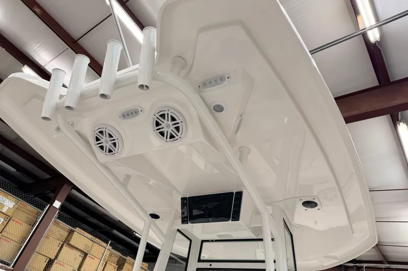 Slide: The Image of 2026 Tidewater 210 CC Adventure boat with ABYC certification and Electrotab trim tab. - 22