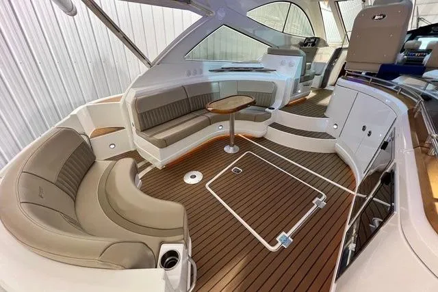Slide: The Image of 2009 CRUISERS YACHT 520SC interior with elegant seating and wooden flooring. - 25