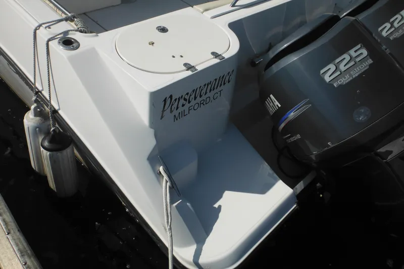 Slide: The Image of 2005 Seaswirl Striper 2901 Walkaround O/B with Yamaha 225 engine, docked in Milford, CT. - 10