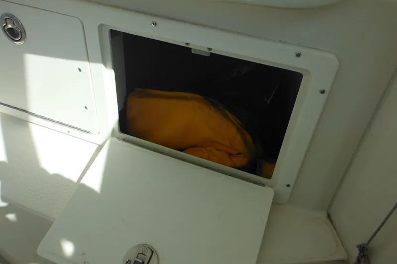 Slide: The Image of Open storage compartment on 2005 Seaswirl Striper 2901 Walkaround O/B boat. - 48