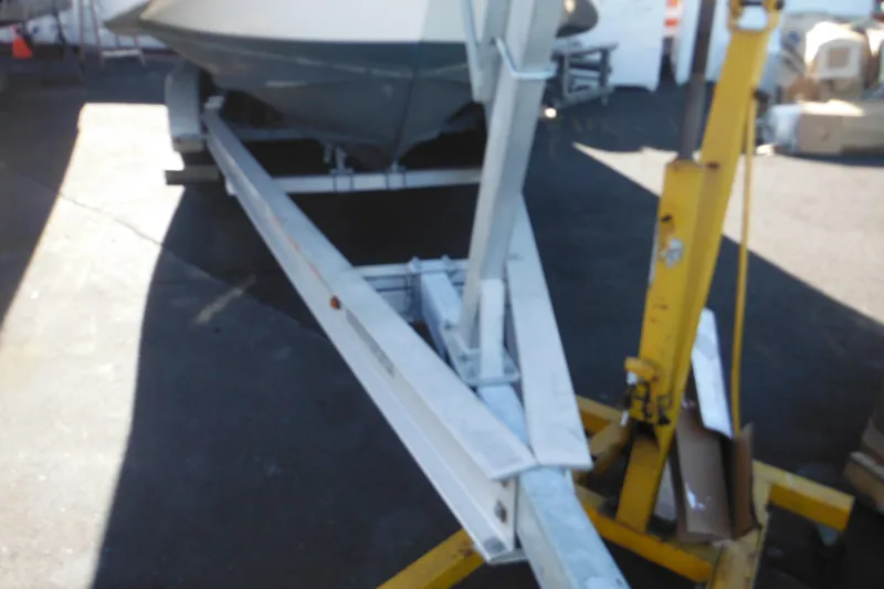 Slide: The Image of 2005 Seaswirl Striper 2901 Walkaround O/B on trailer, parked in a lot. - 65
