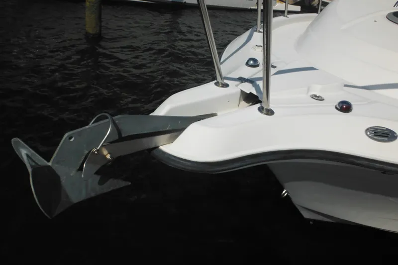 Slide: The Image of 2005 Seaswirl Striper 2901 Walkaround O/B boat with anchor detail. - 7