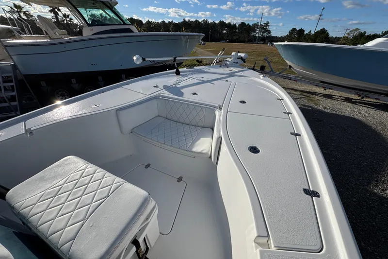 Slide: The Image of 2025 Blazer Bay 2700 Hybrid boat with spacious seating and sleek design. - 19