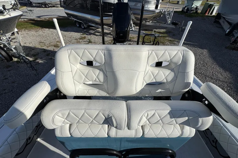 Slide: The Image of Luxurious white seating on 2025 Blazer Bay 2700 Hybrid boat, featuring diamond stitching. - 30