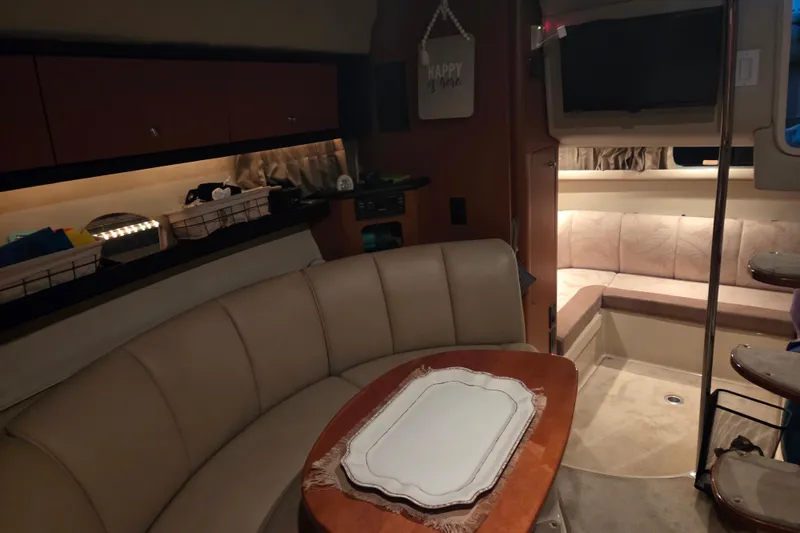 Slide: The Image of Interior of 2005 Chaparral Signature 310 yacht with cozy seating and elegant decor. - 20