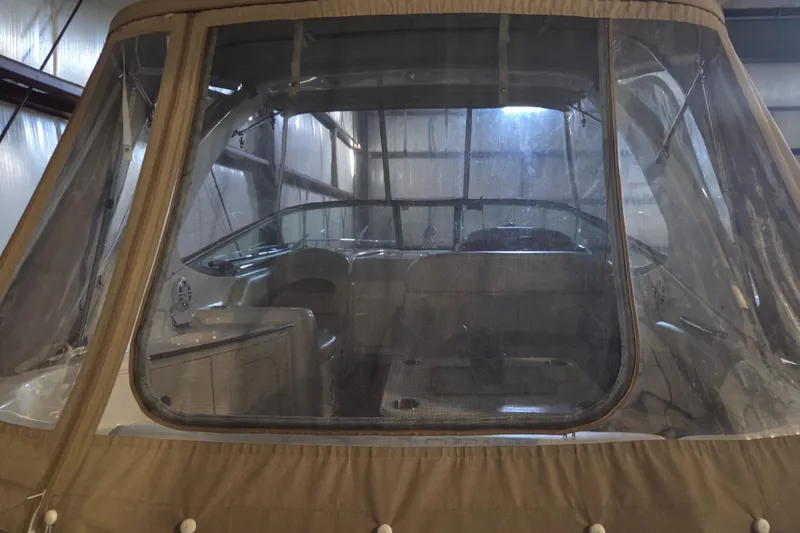 Slide: The Image of 2005 Chaparral Signature 310 boat interior with protective cover in storage. - 29