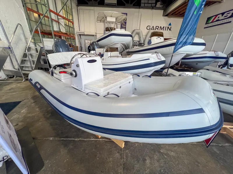 Slide: The Image of 2023 AB Inflatables Nautilus 13 DLX inflatable boat on display in showroom. - 2