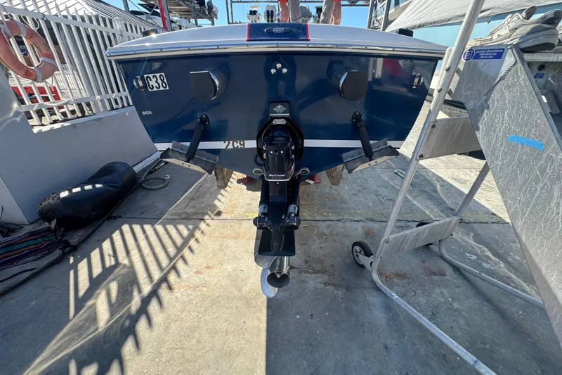 Slide: The Image of Rear view of a 2002 Donzi 22 Shelby GT boat on a trailer. - 7