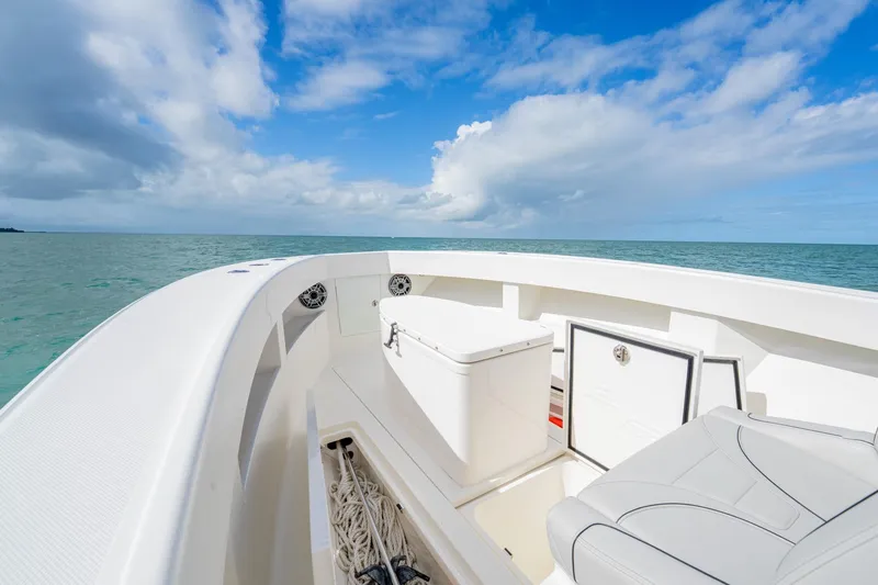 Slide: The Image of Front deck of SeeVee 32 boat, 2099 model, on open sea under blue sky. - 19