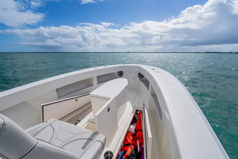 Slide: The Image of Futuristic SeeVee 32 boat on open water, showcasing sleek design and spacious deck. - 20