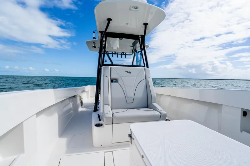 Slide: The Image of Futuristic SeeVee 32 boat on open water, showcasing sleek design and modern features, year 2099. - 25