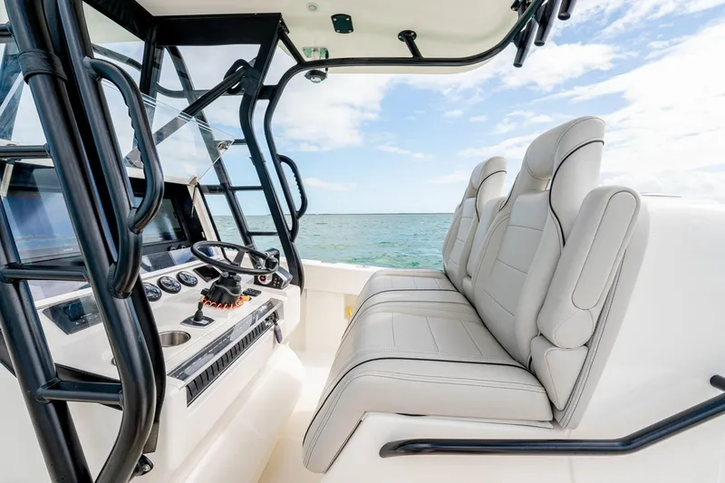 Slide: The Image of Modern SeeVee 32 boat interior with sleek seating and ocean view, year 2099 model. - 29