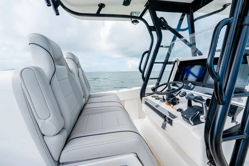 Slide: The Image of Modern SeeVee 32 boat interior with sleek seating and advanced control panel, year 2099. - 30