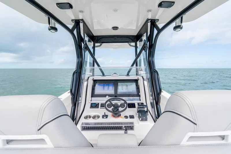 Slide: The Image of Interior view of futuristic SeeVee 32 boat, 2099 model, with advanced navigation system. - 32
