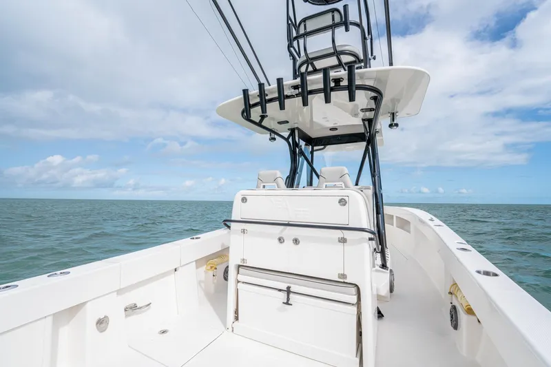 Slide: The Image of SeeVee 32 boat on open sea, showcasing modern design and spacious deck, year 2099. - 40