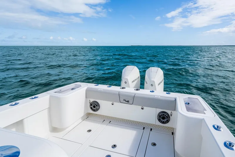 Slide: The Image of Sleek SeeVee 32 boat with dual engines on open sea, 2099 model. - 44