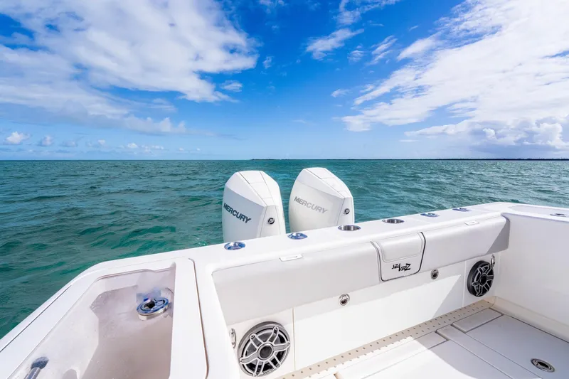 Slide: The Image of SeeVee 32 boat with Mercury engines on open sea, clear sky, 2099 model. - 45