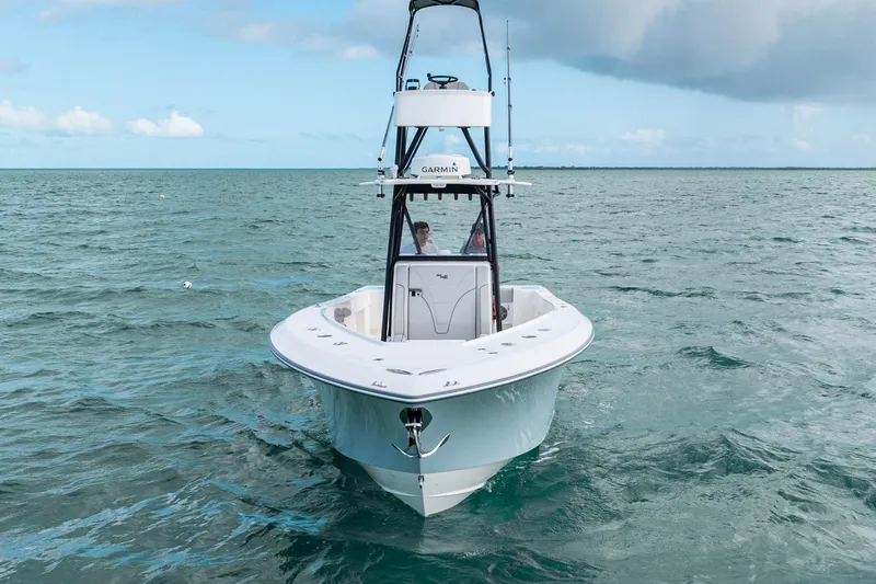 Slide: The Image of Futuristic SeeVee 32 boat navigating open sea under cloudy sky, 2099 model. - 7