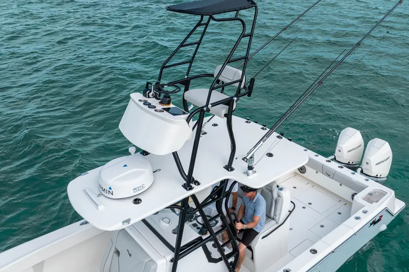 Slide: The Image of SeeVee 32 boat on water, featuring advanced navigation and fishing equipment, 2099 model. - 9