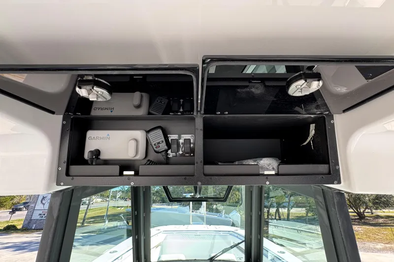 Slide: The Image of Overhead console of 2026 Caymas 34 CT boat with Garmin electronics. - 31