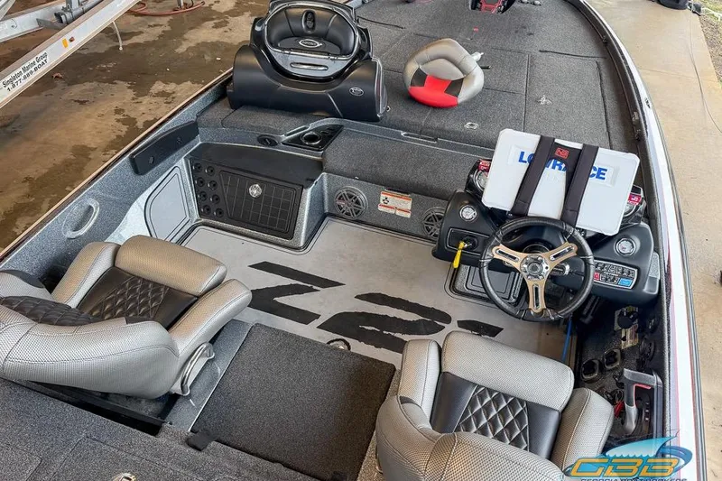 Slide: The Image of 2016 Nitro Z21 Pro boat interior with steering wheel and seating. - 15
