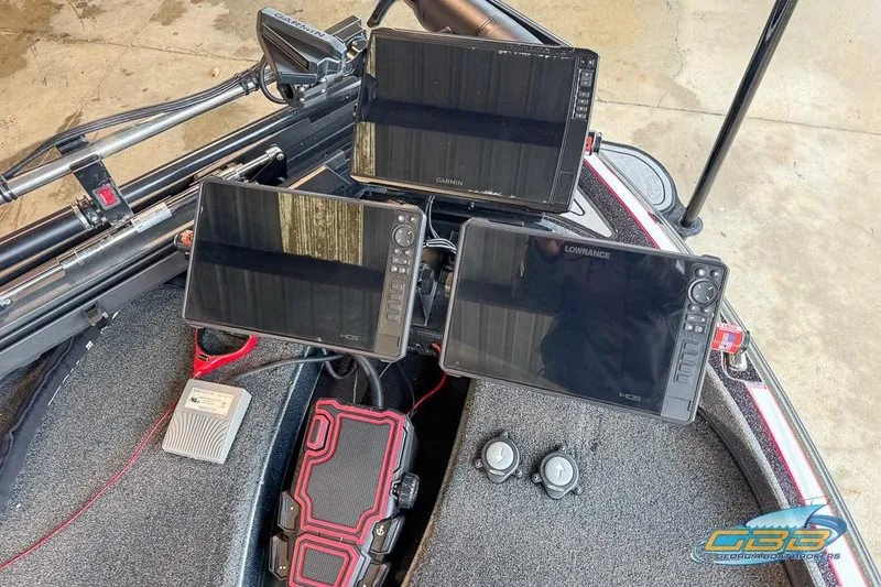 Slide: The Image of 2016 Nitro Z21 Pro boat dashboard with Garmin and Lowrance fish finders. - 16