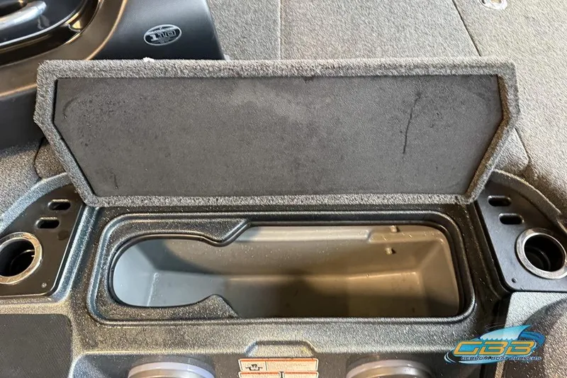 Slide: The Image of Open storage compartment in a 2016 Nitro Z21 Pro boat. - 19