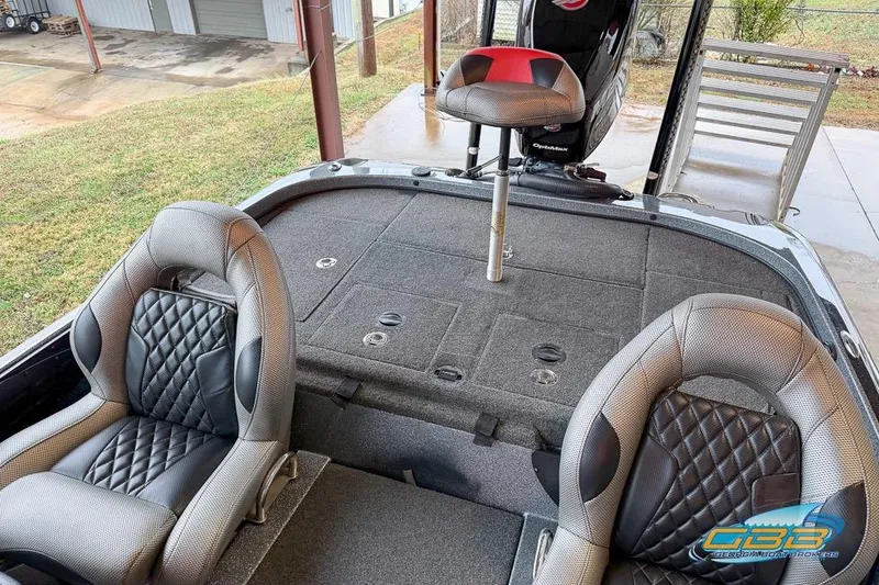 Slide: The Image of 2016 Nitro Z21 Pro boat interior with cushioned seats and fishing deck. - 20