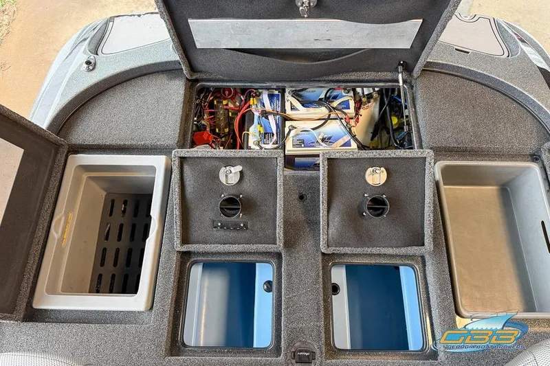 Slide: The Image of 2016 Nitro Z21 Pro boat storage compartments and battery setup. - 21