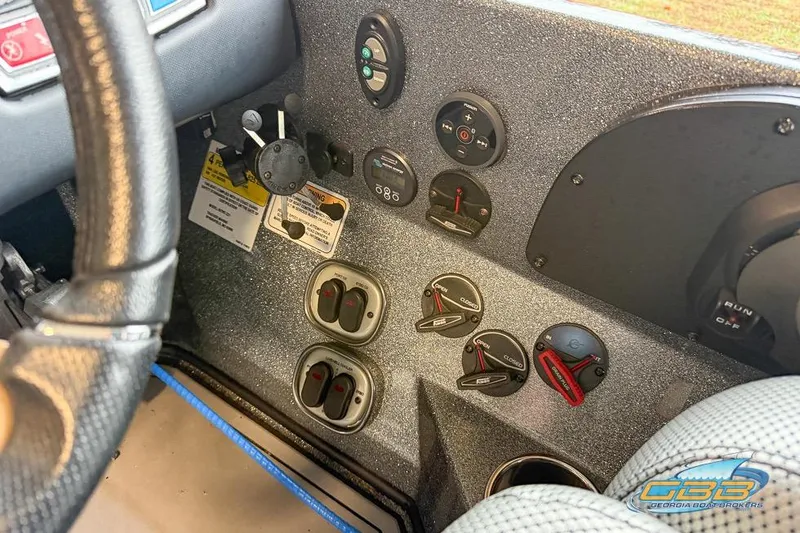 Slide: The Image of 2016 Nitro Z21 Pro dashboard with controls and gauges, featuring a textured finish. - 24