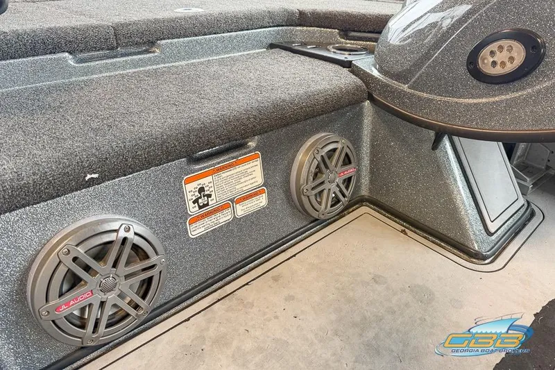 Slide: The Image of 2016 Nitro Z21 Pro boat interior with JL Audio speakers and warning labels. - 25