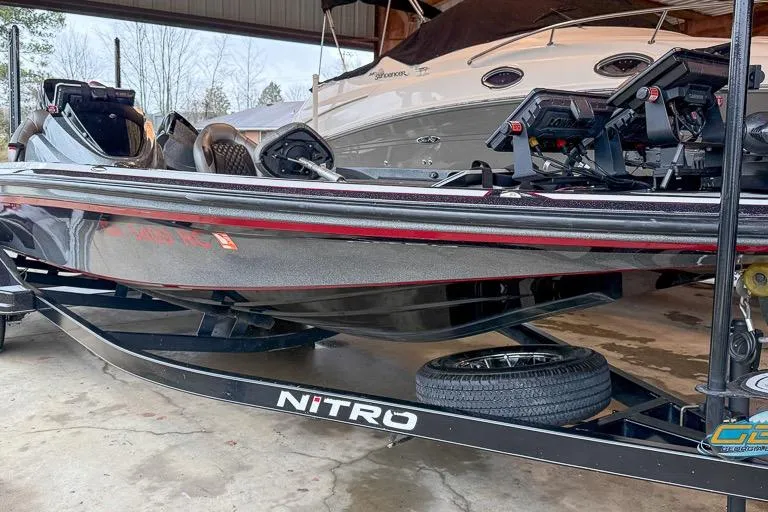 Slide: The Image of 2016 Nitro Z21 Pro boat in storage, featuring sleek design and advanced equipment. - 29
